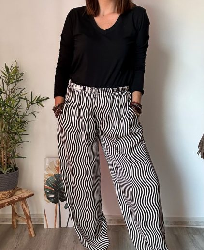 Pantalón satinado beige y negro