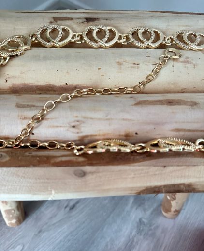 Cinturón cadena corazón dorado